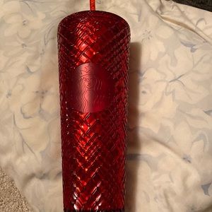 Starbucks red venti cup. Diamond pattern.